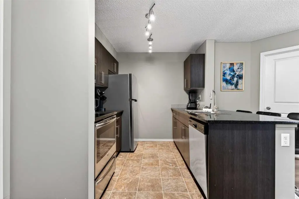 403 Mackenzie Way SW #9103