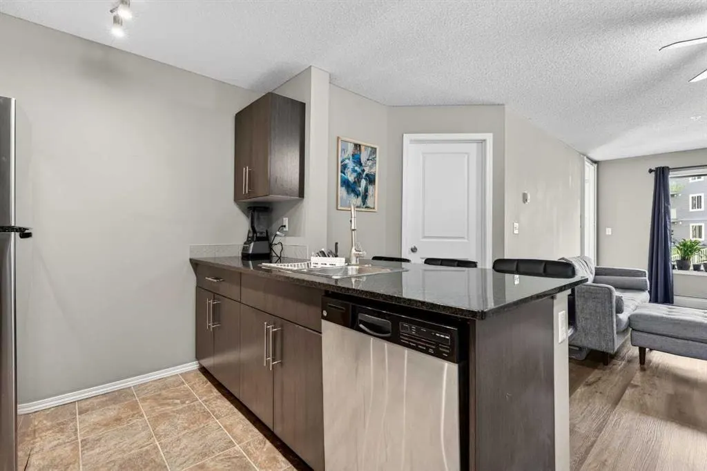 403 Mackenzie Way SW #9103